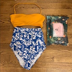 Yellow and blue cutout one piece new w/o tag